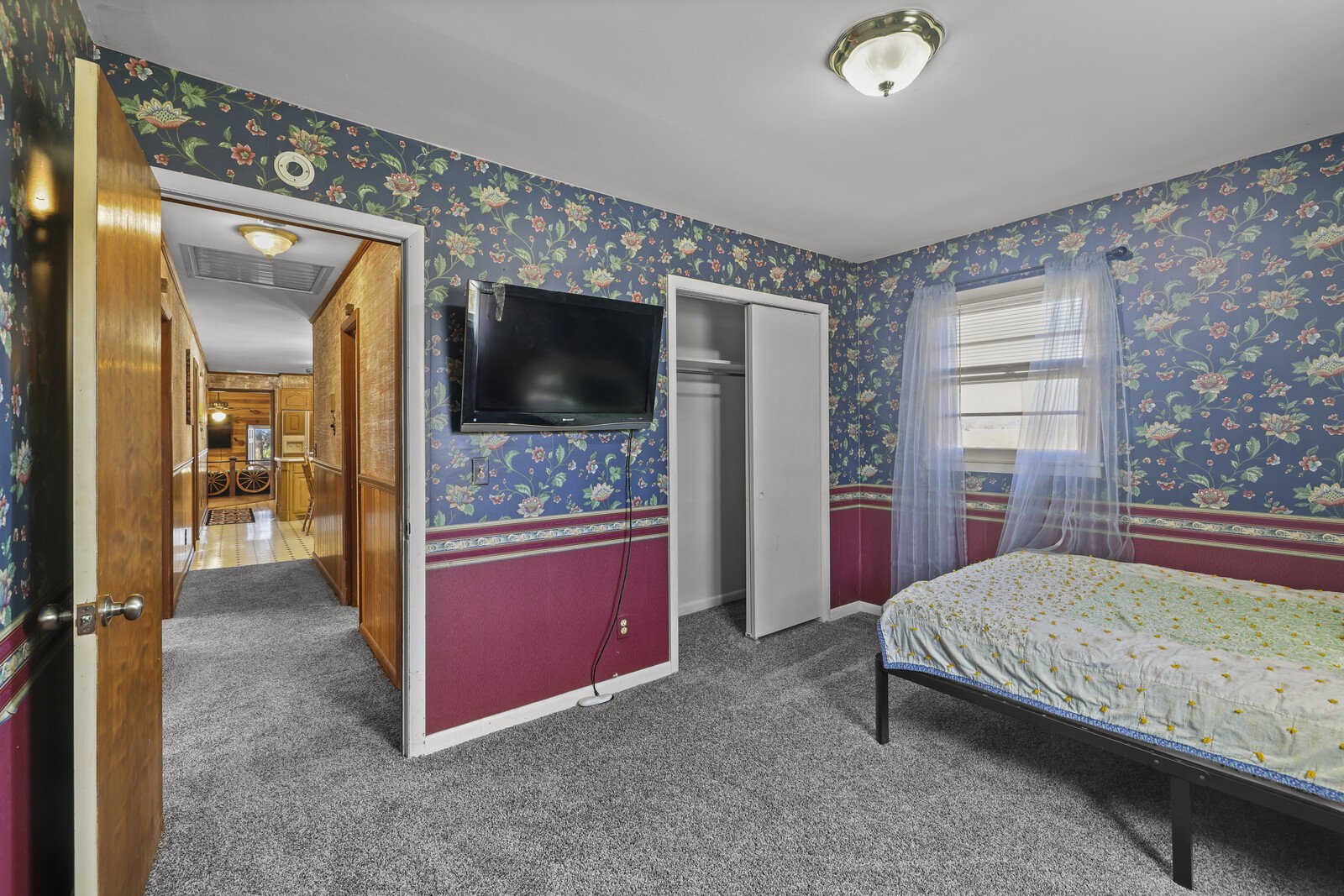 2521 Old Airport Road Hillsboro, TN 37342 - Photo 30 of 87 a bedroom with a bed and a flat screen tv