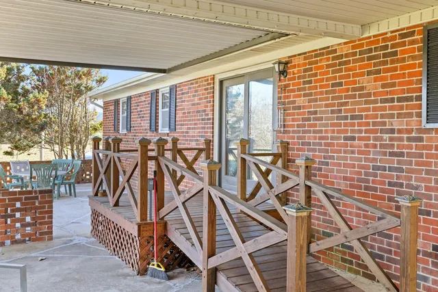 a dining room with granite countertop furniture and window