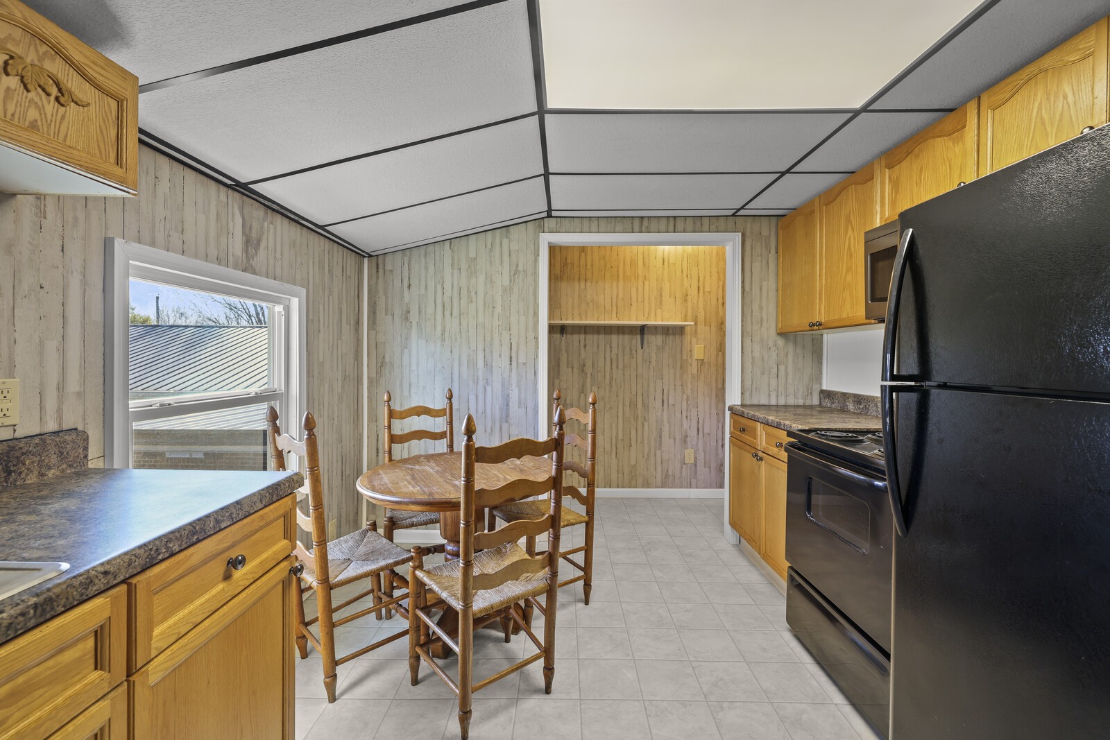2521 Old Airport Road Hillsboro, TN 37342 - Photo 56 of 87 a kitchen with stainless steel appliances granite countertop a refrigerator and a stove top oven