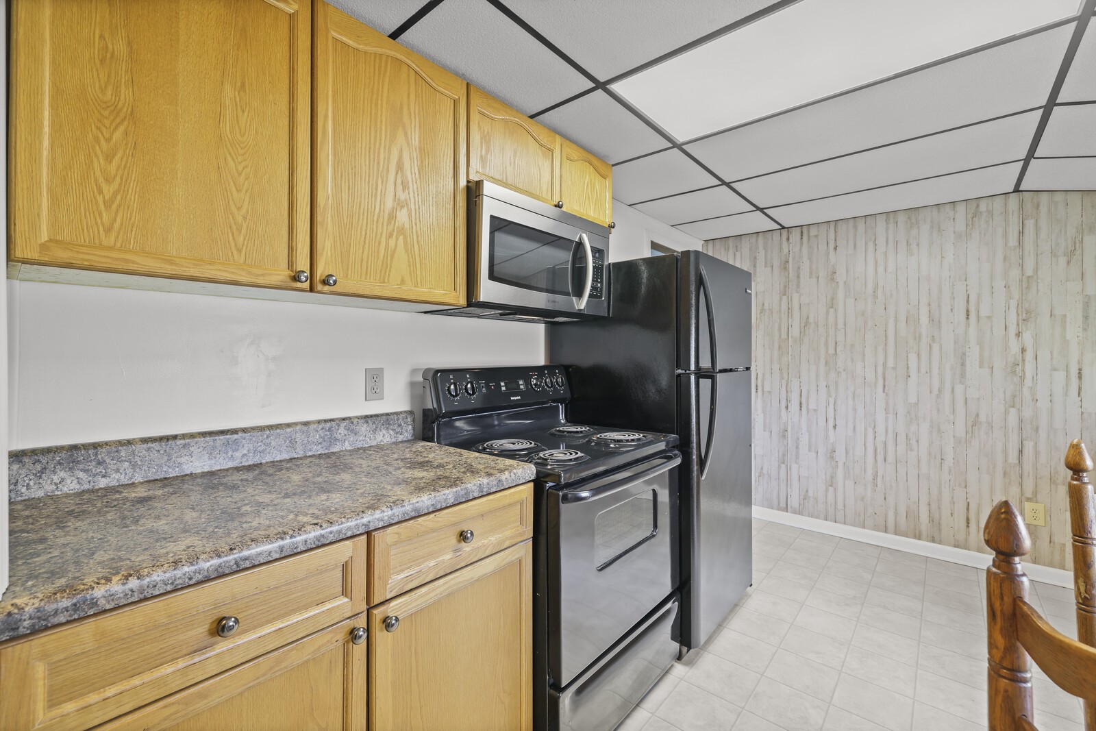 2521 Old Airport Road Hillsboro, TN 37342 - Photo 58 of 87 a kitchen with stainless steel appliances granite countertop a sink stove and refrigerator