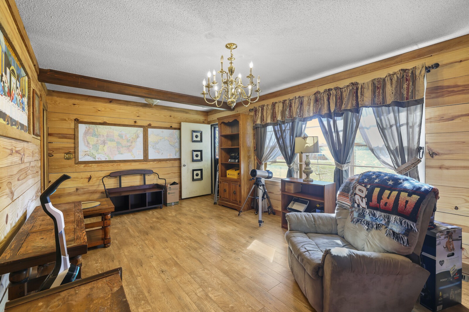 2521 Old Airport Road Hillsboro, TN 37342 - Photo 6 of 87 a living room with furniture a fireplace and a large window