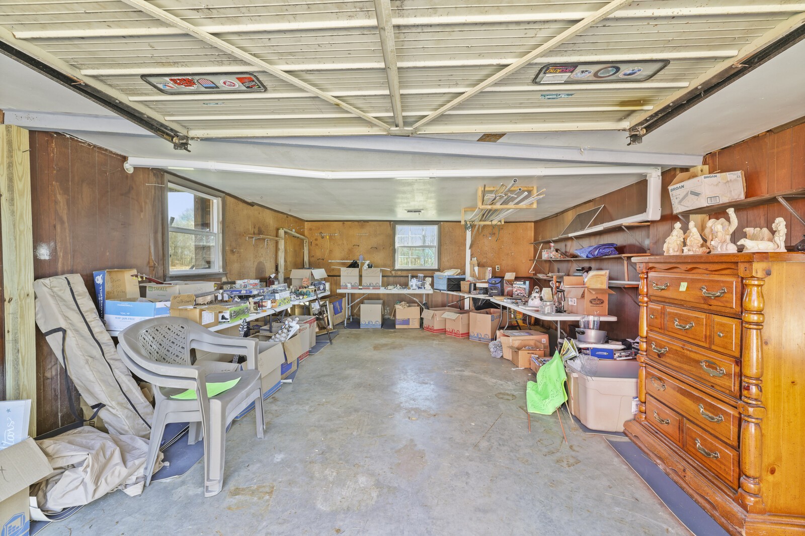 2521 Old Airport Road Hillsboro, TN 37342 - Photo 61 of 87 a living room with lots of furniture and a chandelier