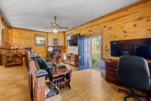 a kitchen with stainless steel appliances granite countertop a sink and a stove