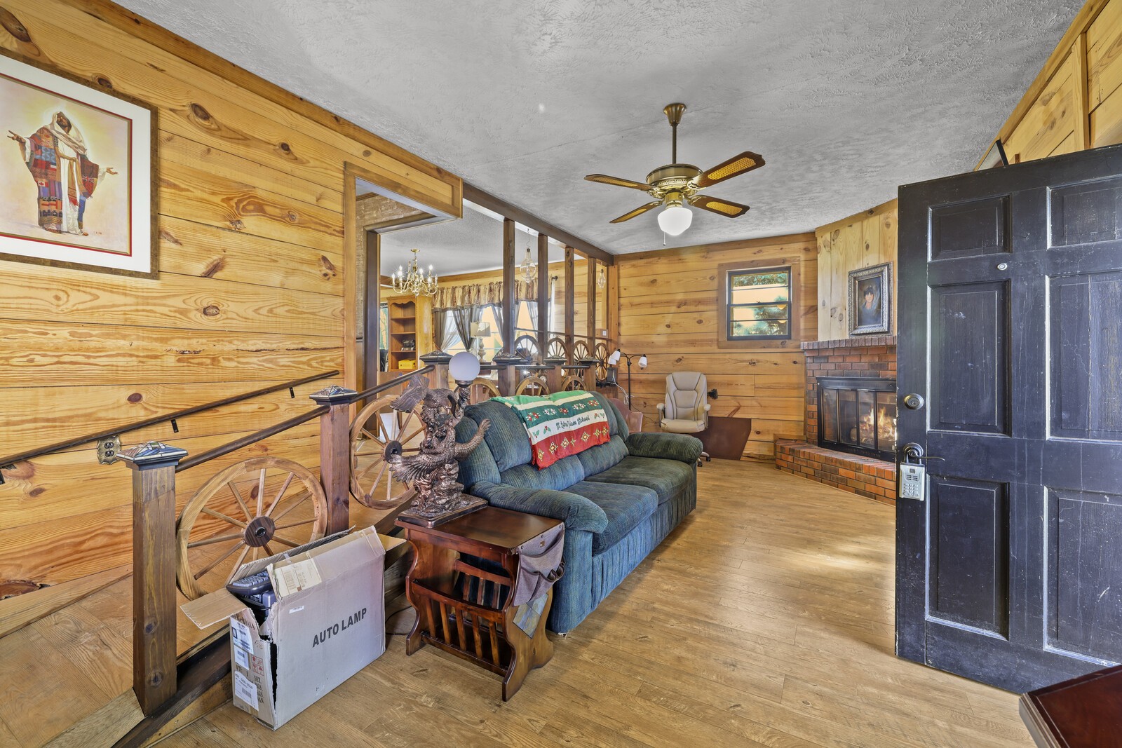 2521 Old Airport Road Hillsboro, TN 37342 - Photo 10 of 87 a living room with furniture a rug and a chandelier