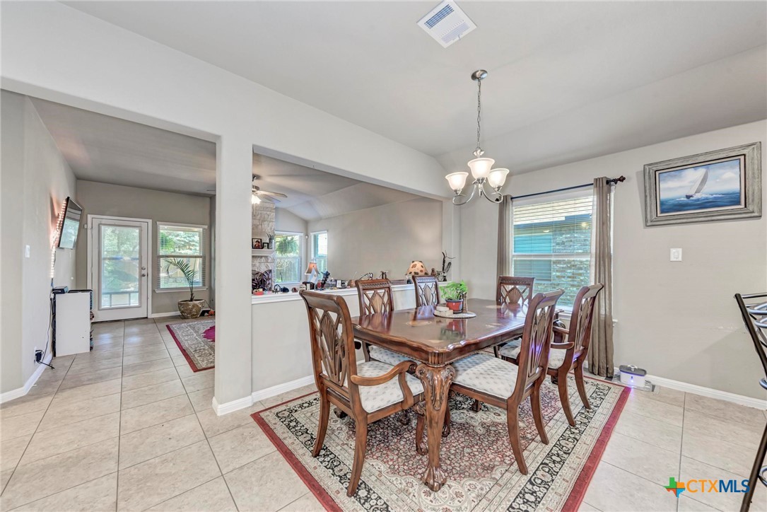 700 Cortona Cove Georgetown, TX 78628 - Photo 12 of 46 Eat-in area of kitchen which opens to the living room