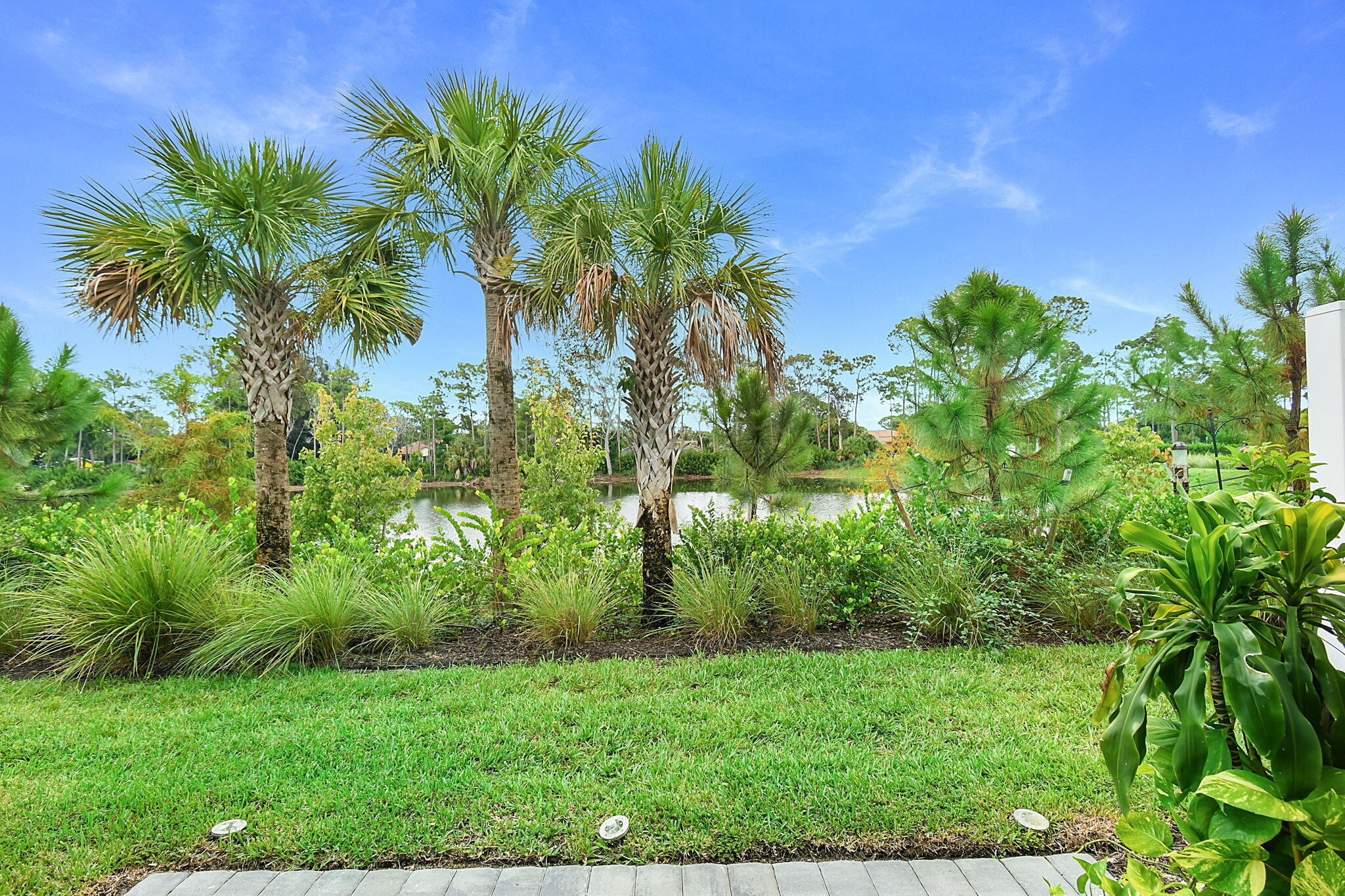 5766 Southeast Edgewater Circle Stuart, FL 34997 - Photo 14 of 41 View of Lake from Rear Patio