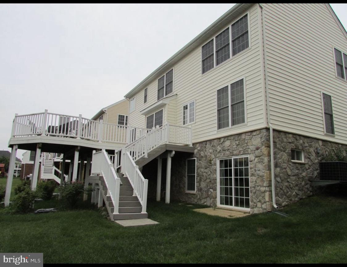 42770 Conquest Circle Brambleton, VA 20148 - Photo 63 of 70 a front view of a house with a yard