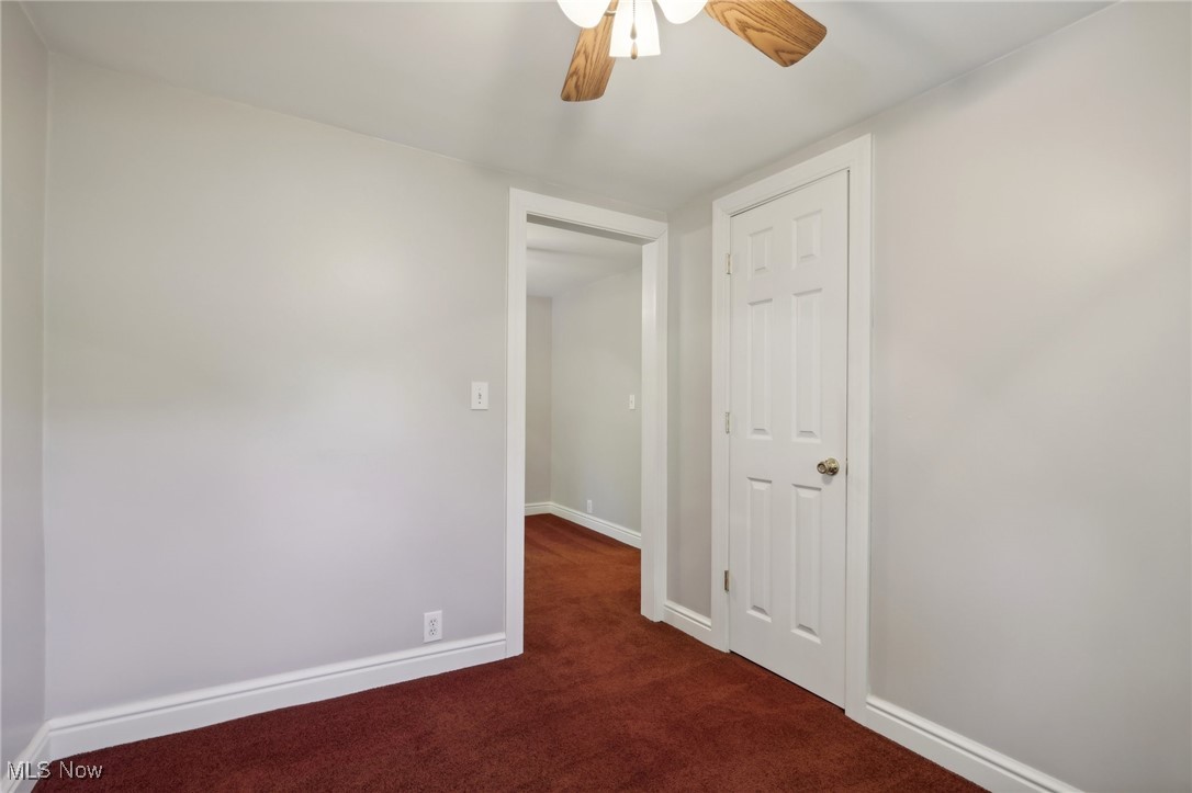 6672 Ross Road Madison, OH 44057 - Photo 37 of 50 Spare room featuring ceiling fan and carpet