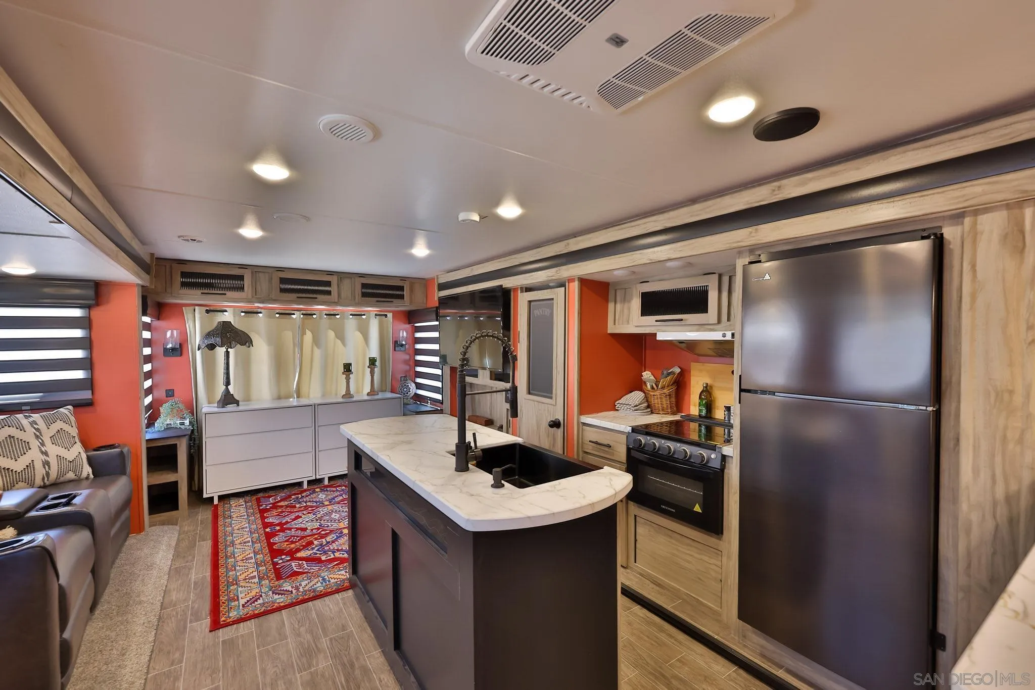 10993 Explorer Road La Mesa, CA 91941 - Photo 29 of 34 a kitchen with stainless steel appliances granite countertop a refrigerator a sink and a stove