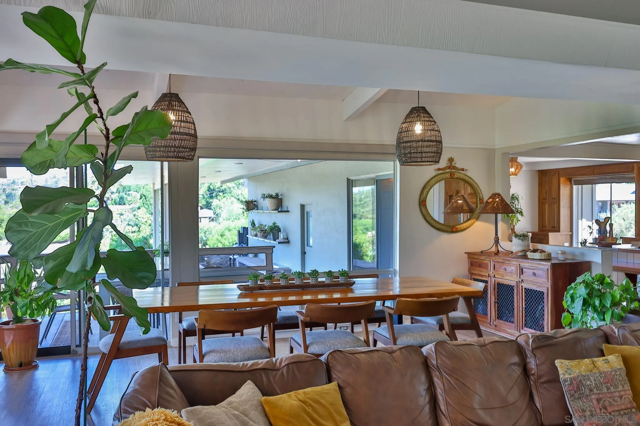 10993 Explorer Road La Mesa, CA 91941 - Photo 5 of 34 a living room with furniture a potted plant and a large window