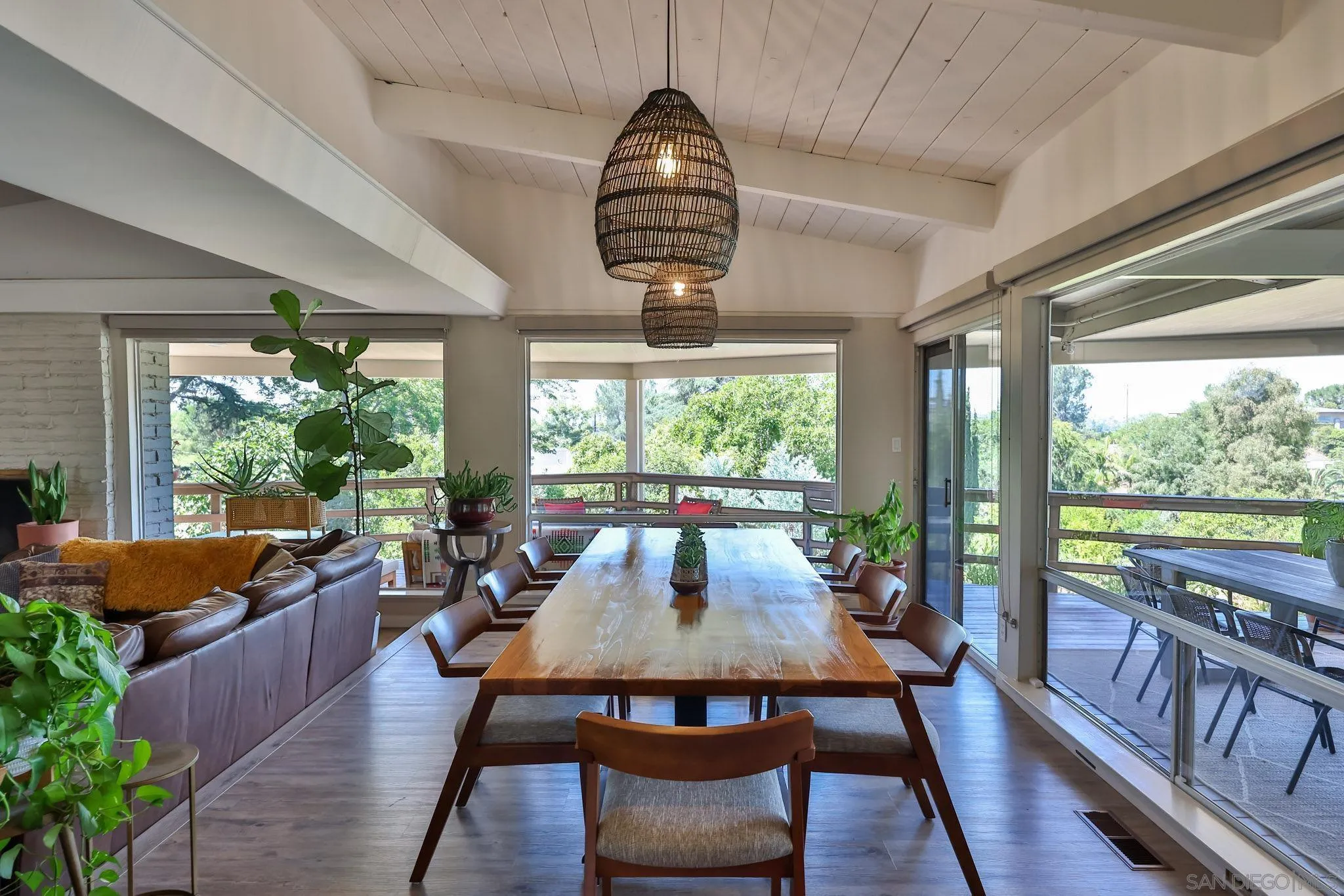 10993 Explorer Road La Mesa, CA 91941 - Photo 8 of 34 a view of a dining room with furniture window and wooden floor