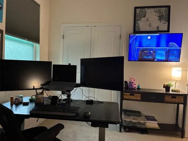 a bed room with bed and a window