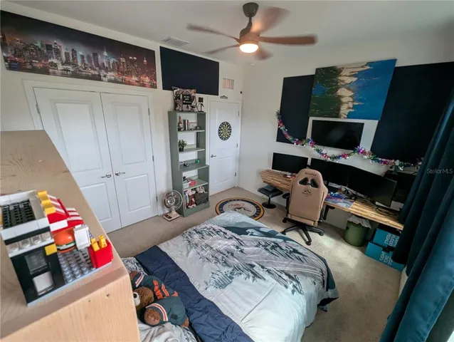 a room with furniture and a flat screen tv