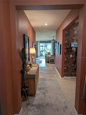 a view of a hallway with living area