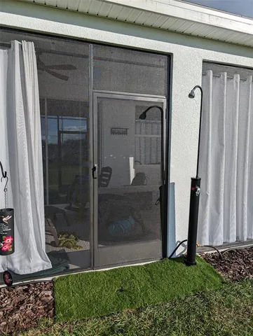 a view of backyard with shower