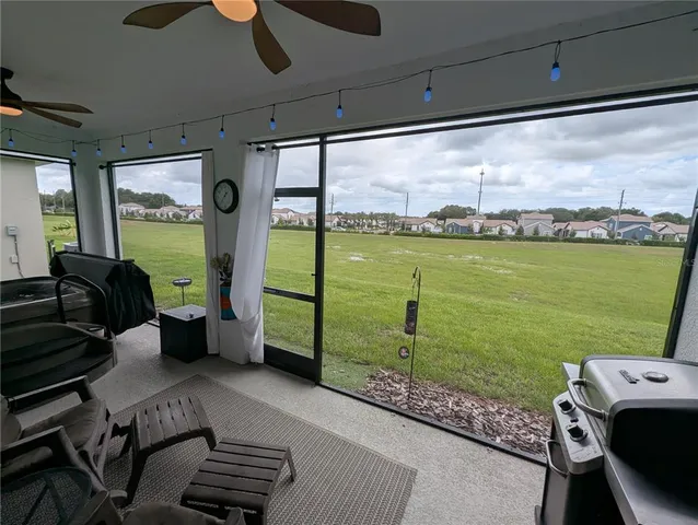 a kitchen with sink and refrigerator