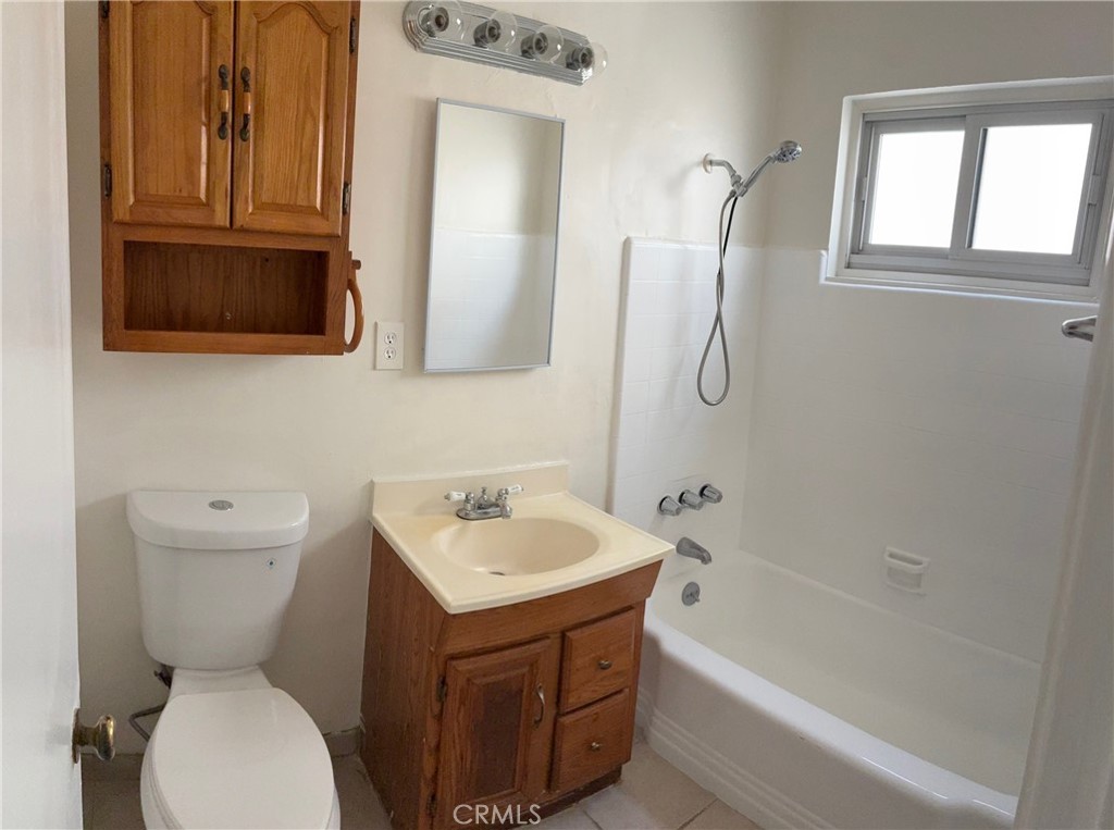 640 West Imperial Avenue, Unit 2 El Segundo, CA 90245 - Photo 7 of 9 a bathroom with a toilet sink and mirror