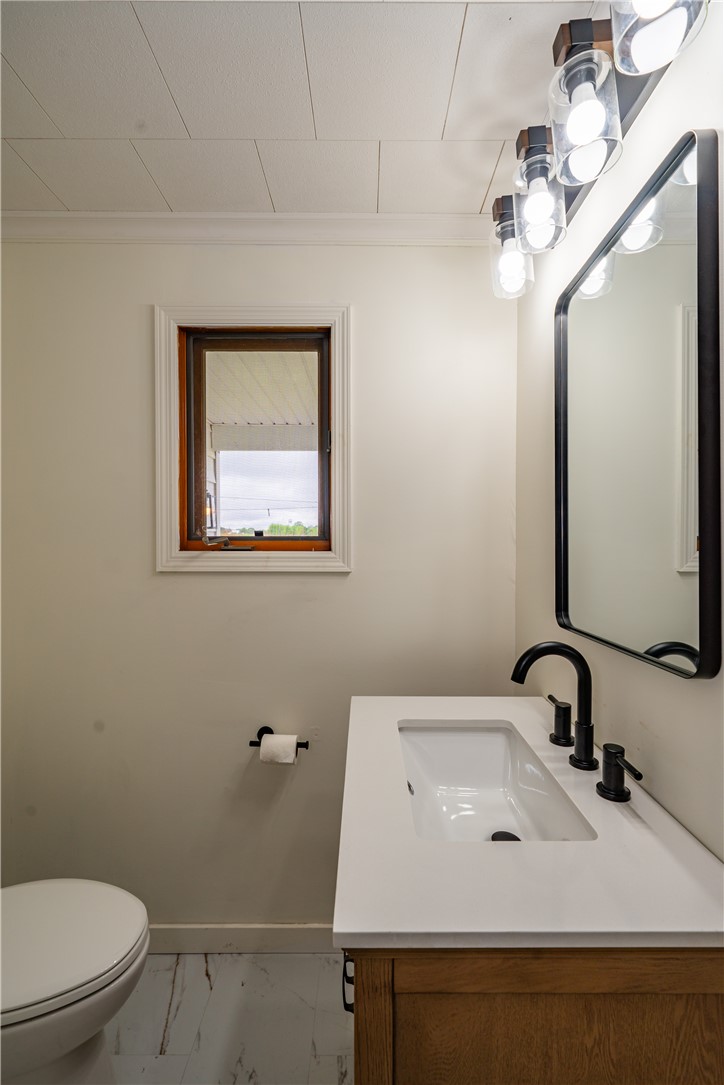 11296 Pansing Road Brookville, OH 45309 - Photo 31 of 53 This clean bathroom features a sleek vanity and modern fixtures.
