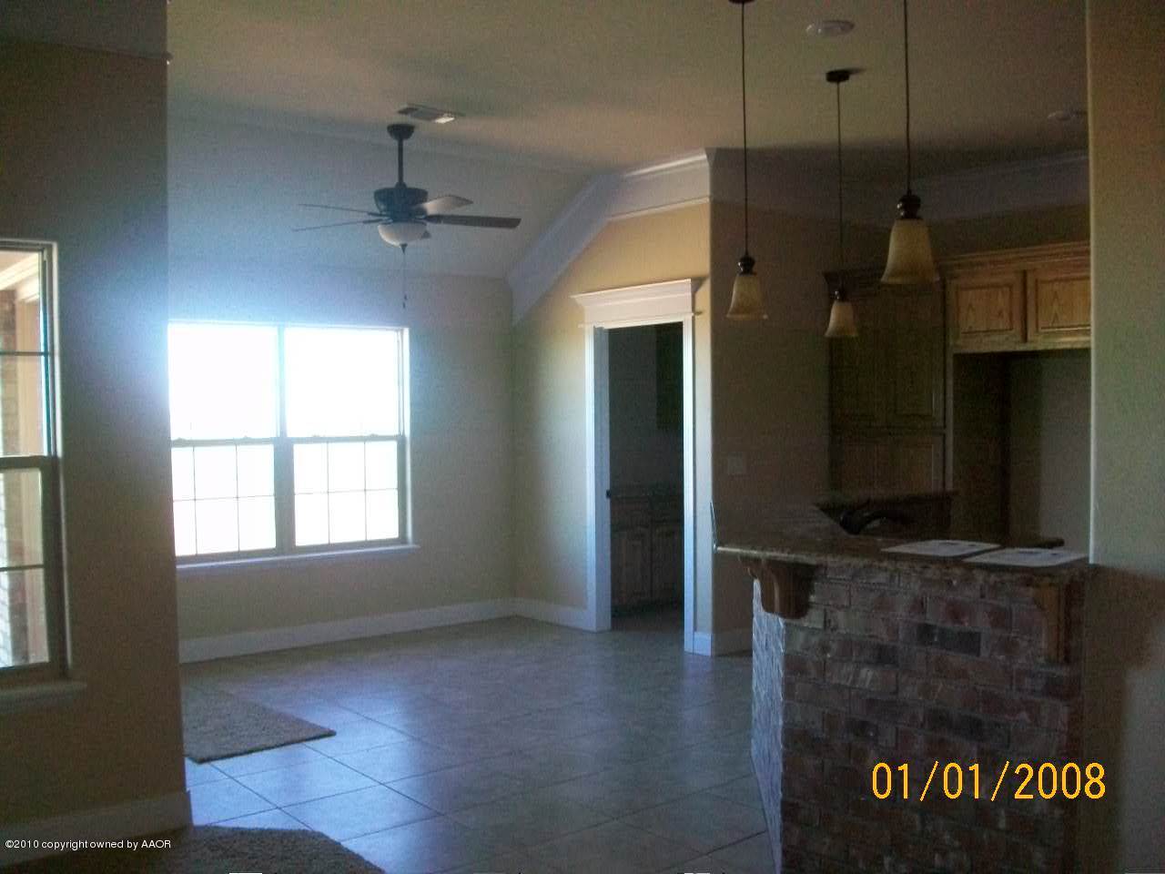 18350 Copper Ridge Bushland, TX 79124 - Photo 9 of 24 wooden floor in an empty room with a window