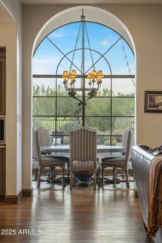 a spacious bathroom with a sink and a mirror