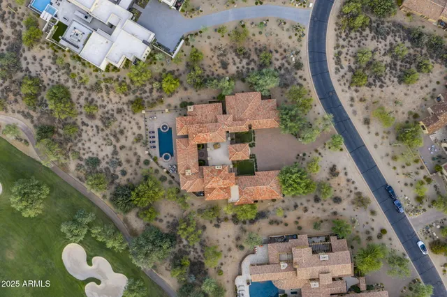 a view of a city with a lake