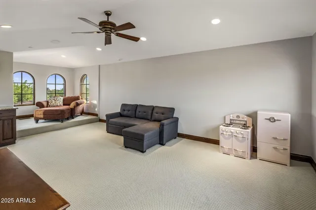 a living room with a couch and a flat screen tv