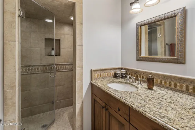 a dining room with furniture and a chandelier
