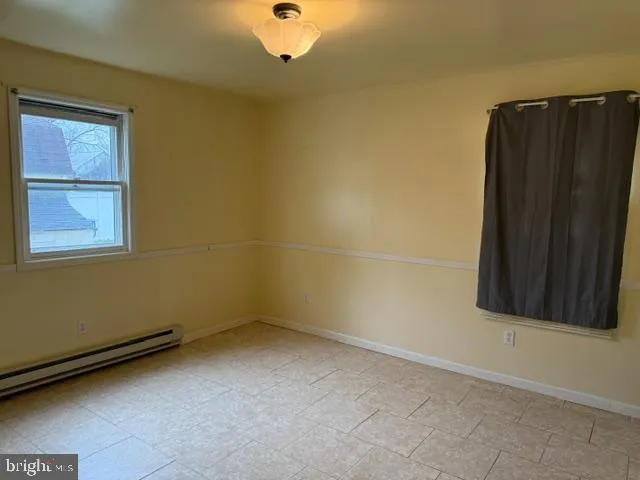 an empty room with a door