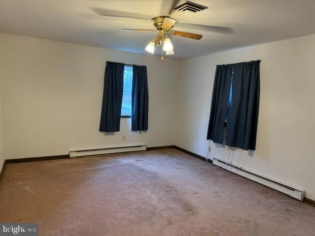 an empty room with window