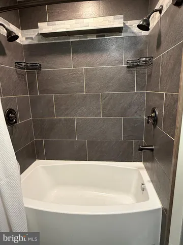 a bathroom with a bathtub
