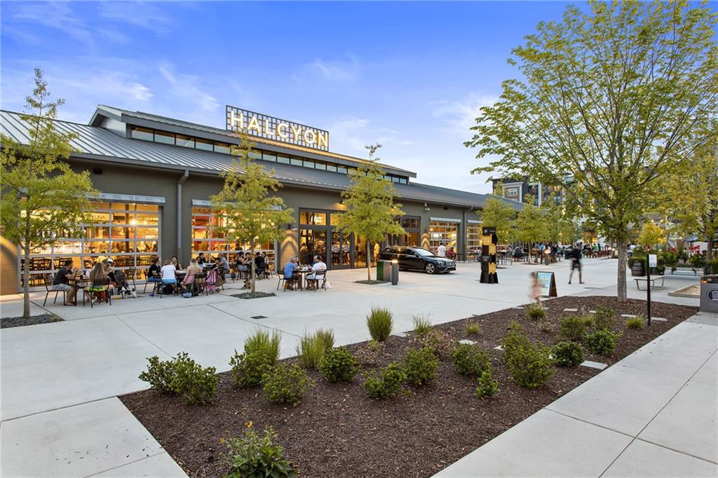 6660 Tulip Plantation Road Alpharetta, GA 30004 - Photo 57 of 68 a view of a building with sitting area