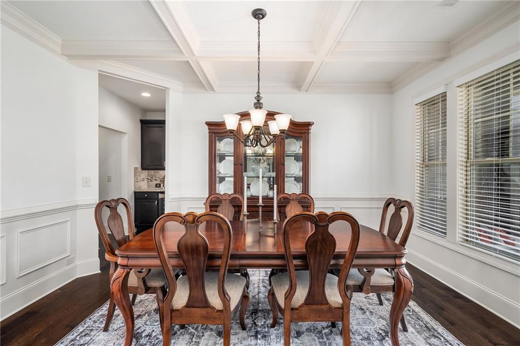 6660 Tulip Plantation Road Alpharetta, GA 30004 - Photo 6 of 68 a view of a dining room with furniture window and wooden floor
