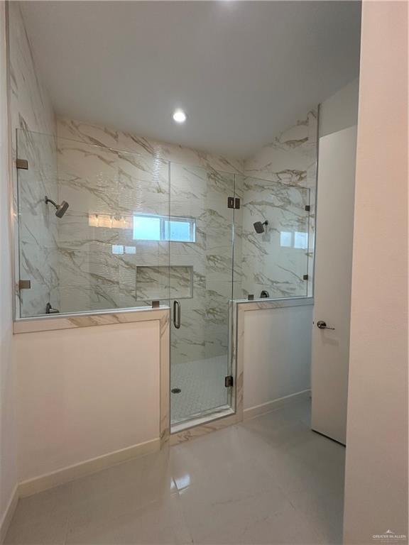 1912 East Ridgeway Circle Edinburg, TX 78542 - Photo 16 of 16 a bathroom with a shower and a sink