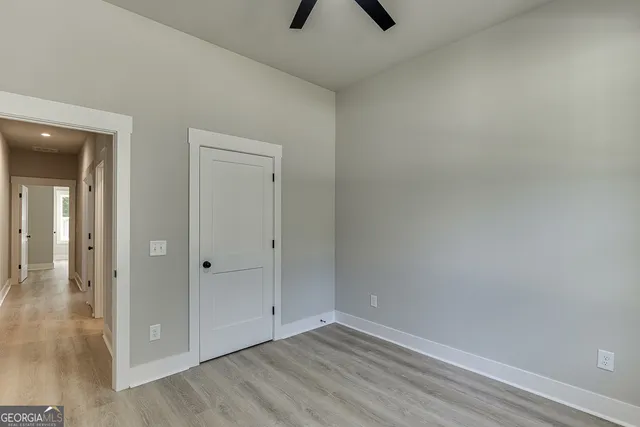 a view of a room with racks on the wall