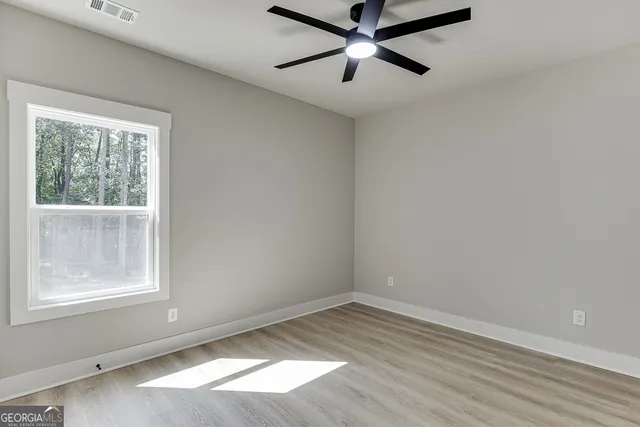 a view of an empty walk in closet
