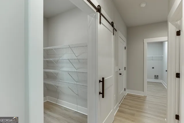 a view of a room that has a window in it