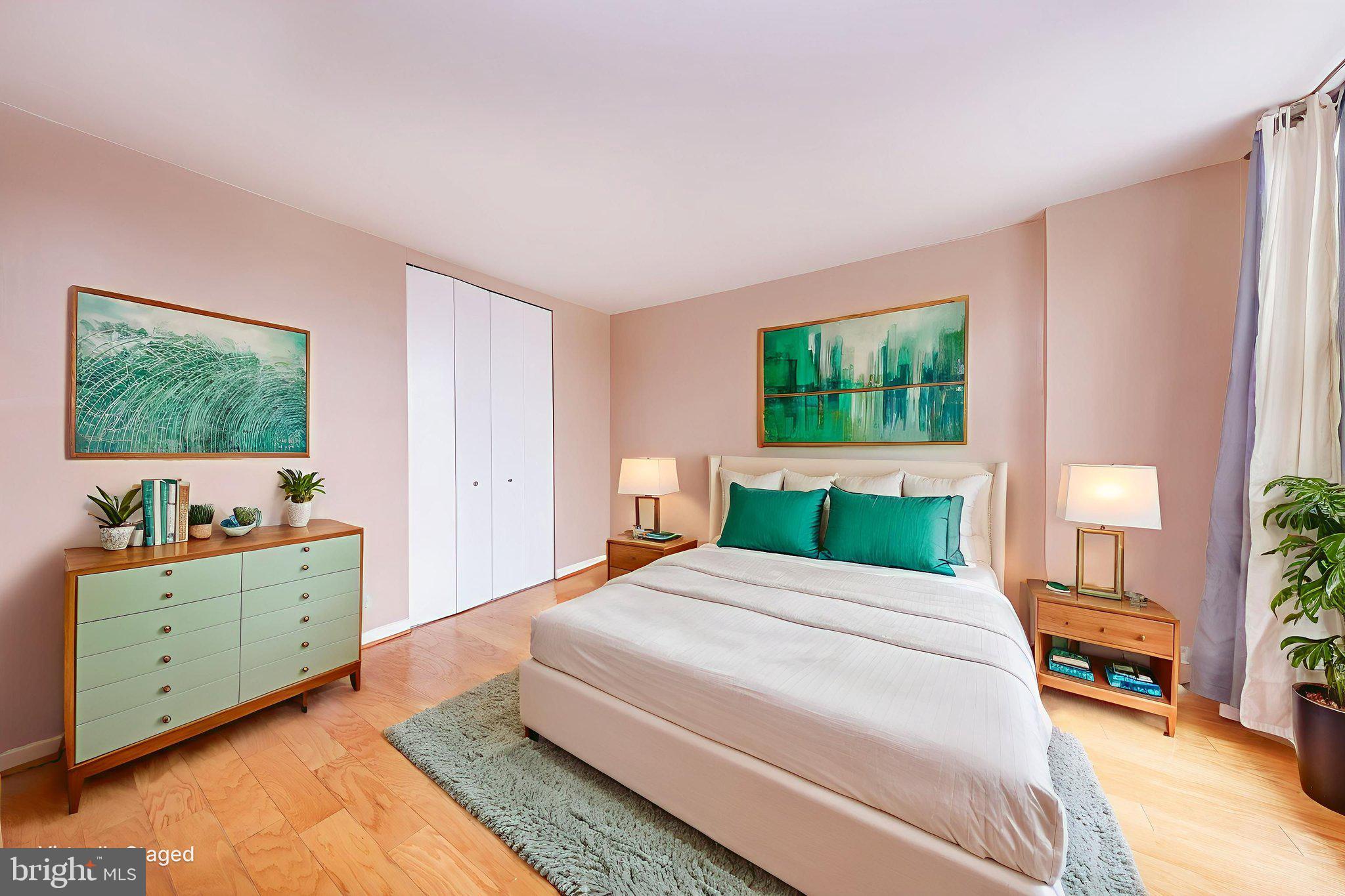 1260 21st Street Northwest, Unit 1004 Washington, DC 20036 - Photo 15 of 27 a bedroom with a bed and a dresser in it