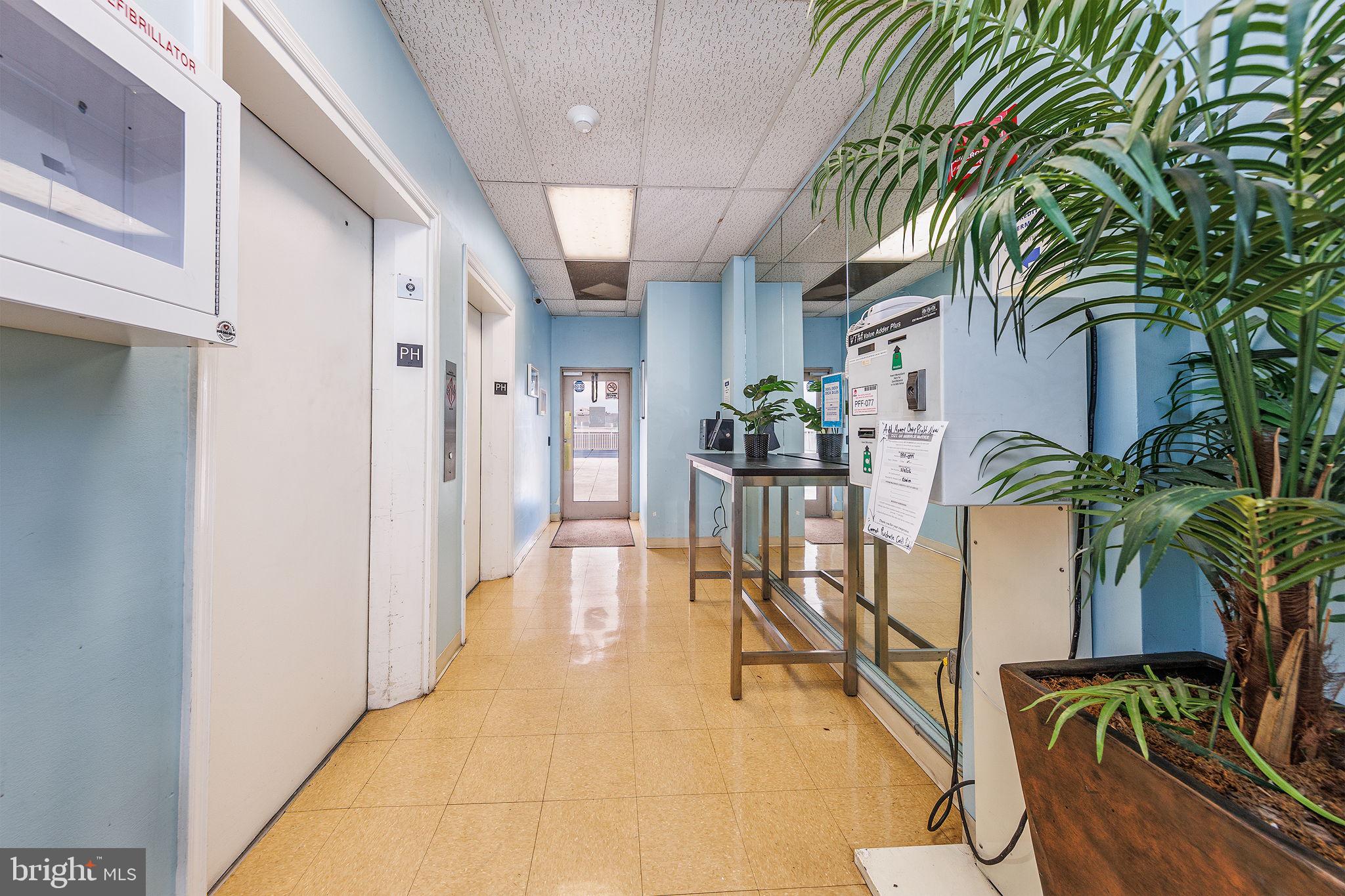 1260 21st Street Northwest, Unit 1004 Washington, DC 20036 - Photo 19 of 27 a view of entryway and hall with wooden floor