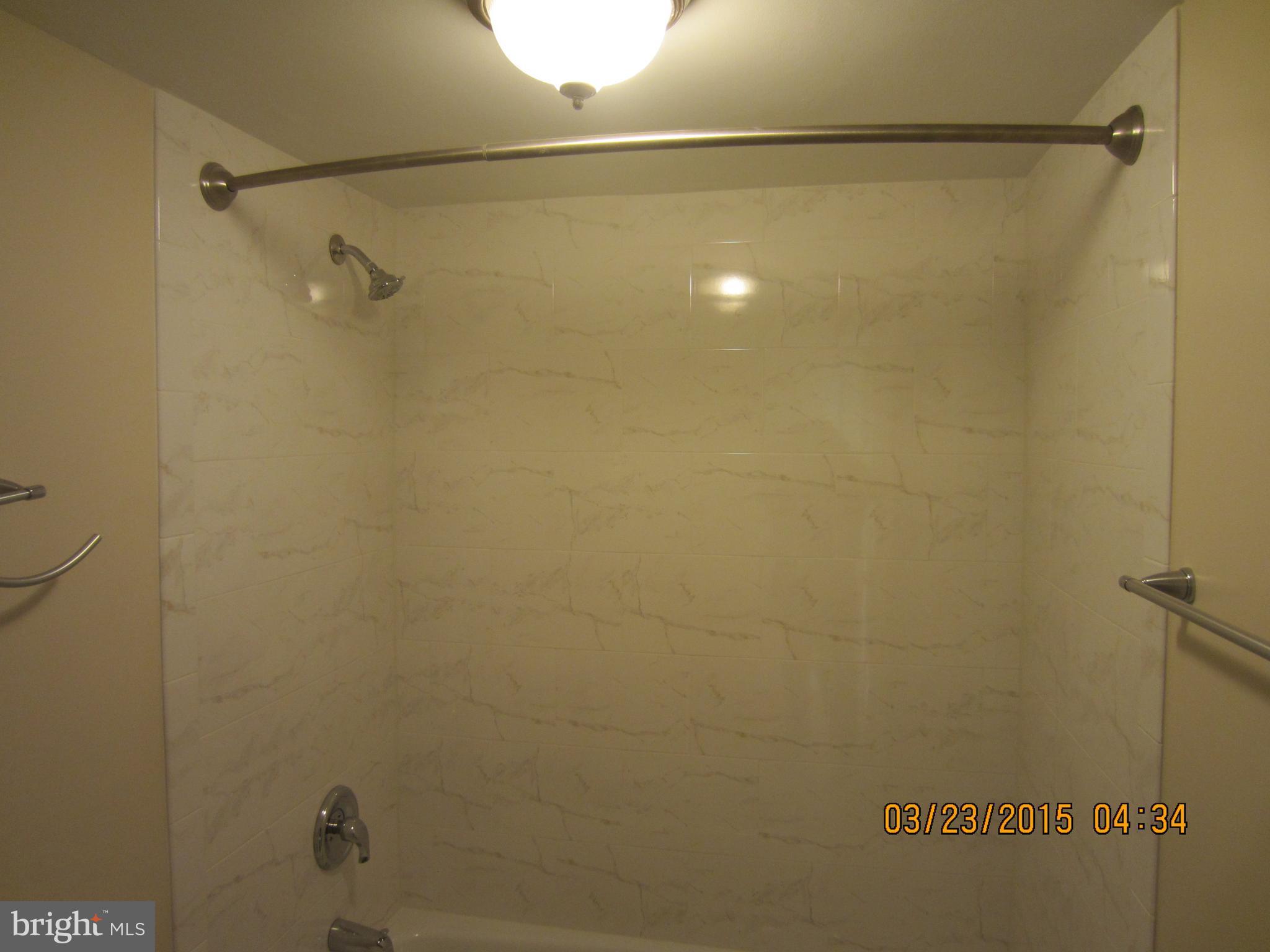 1260 21st Street Northwest, Unit 1004 Washington, DC 20036 - Photo 8 of 8 a bathroom with a shower