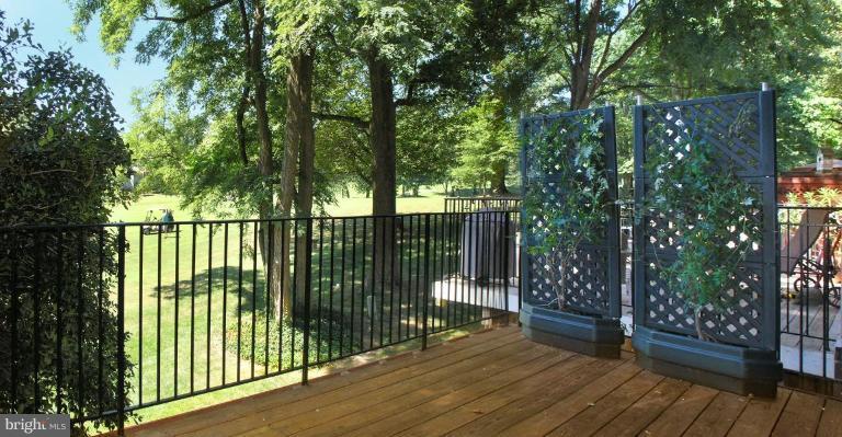 2074 Golf Course Drive Reston, VA 20191 - Photo 5 of 30 a view of a deck with a trees