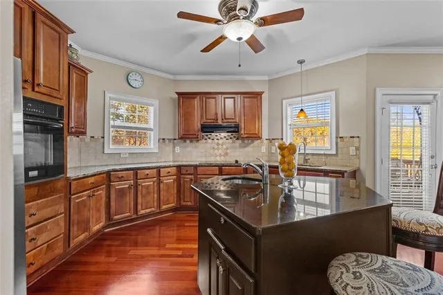 a bath tub sitting next to a window