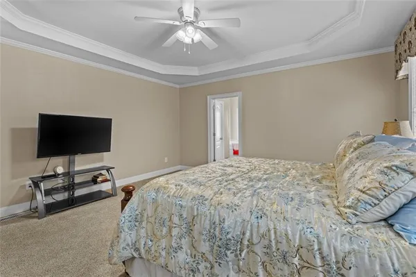 a bathroom with a shower and a sink
