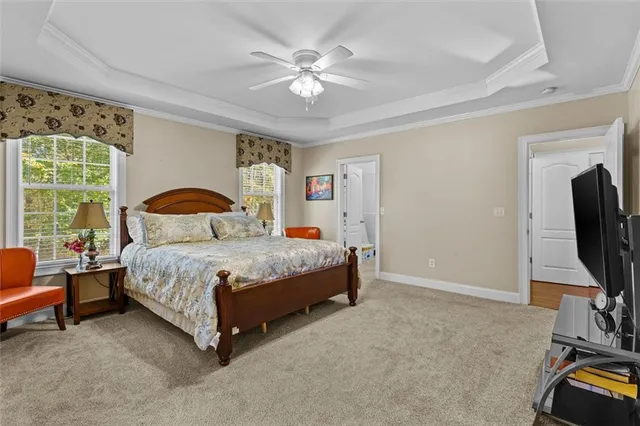 a bedroom with a bed and a table