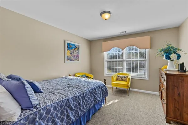 a bathroom with a sink toilet and vanity