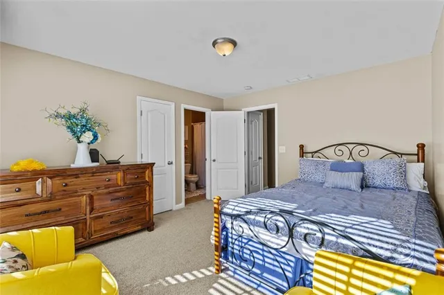 a view of a wooden bench on the roof deck