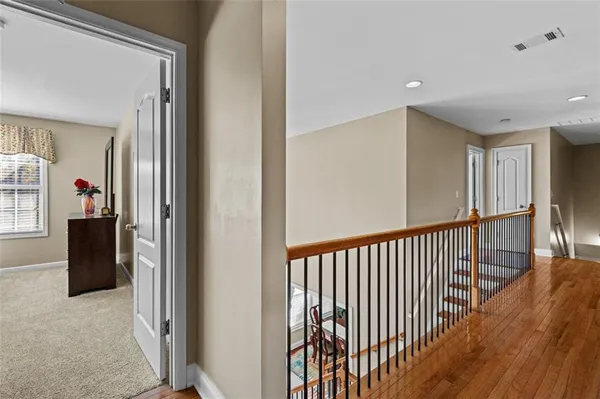 a view of a house with backyard and garden