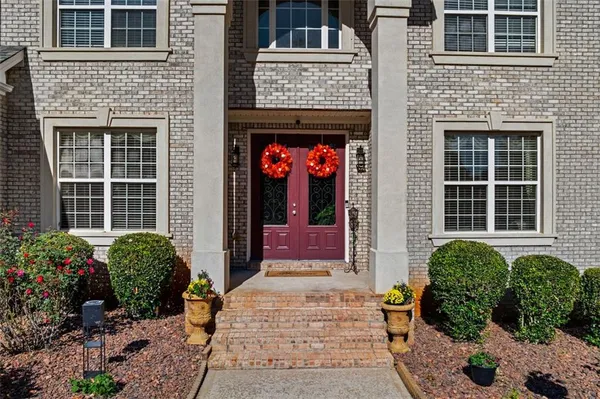 a front view of a house with a entryway
