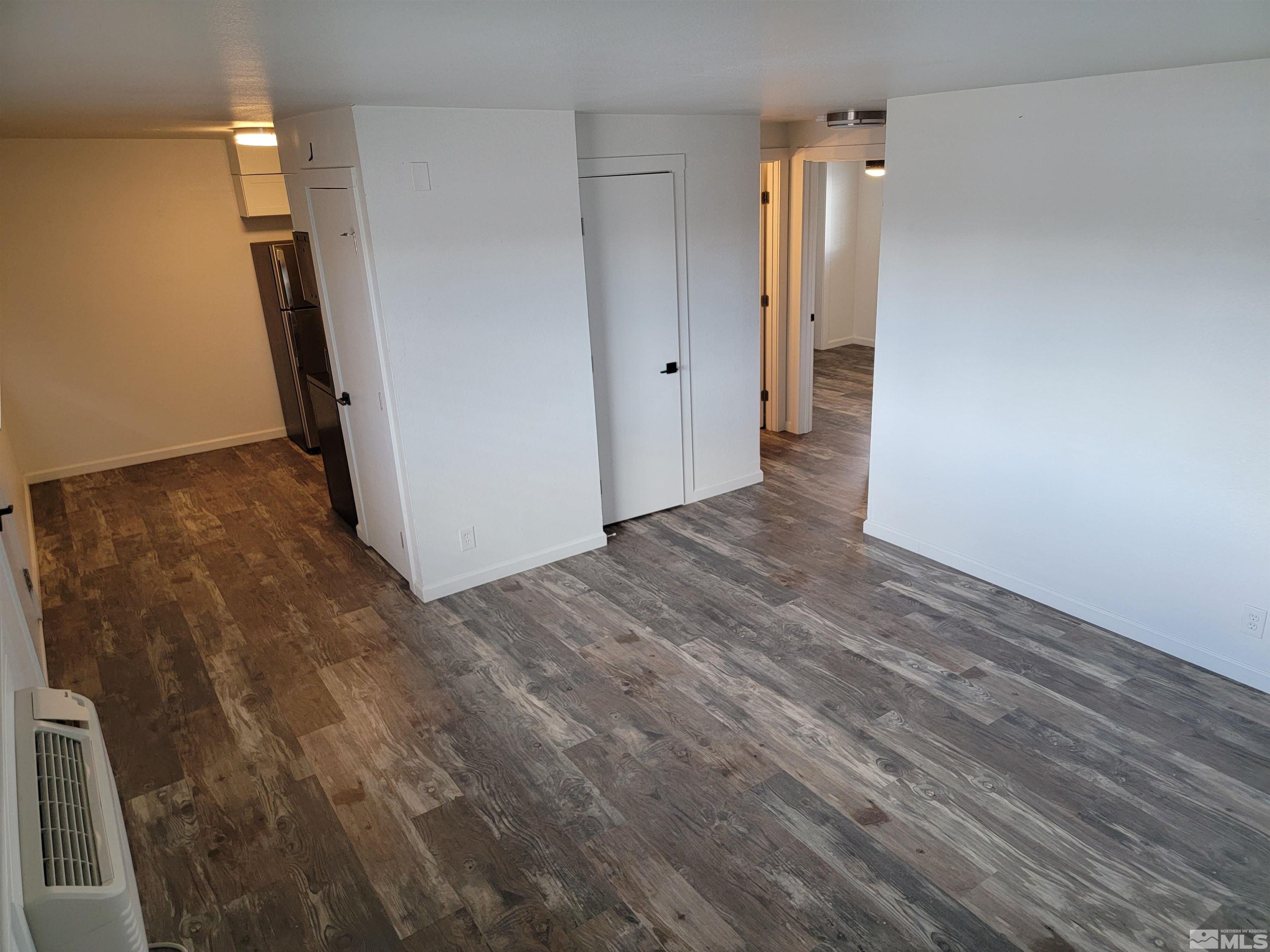 1101 East Taylor Street Reno, NV 89502 - Photo 14 of 17 a view of a hallway with wooden floor