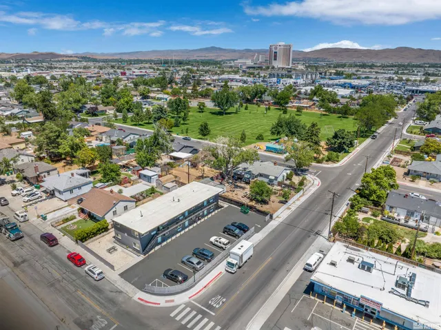an aerial view of a city with lots of residential buildings