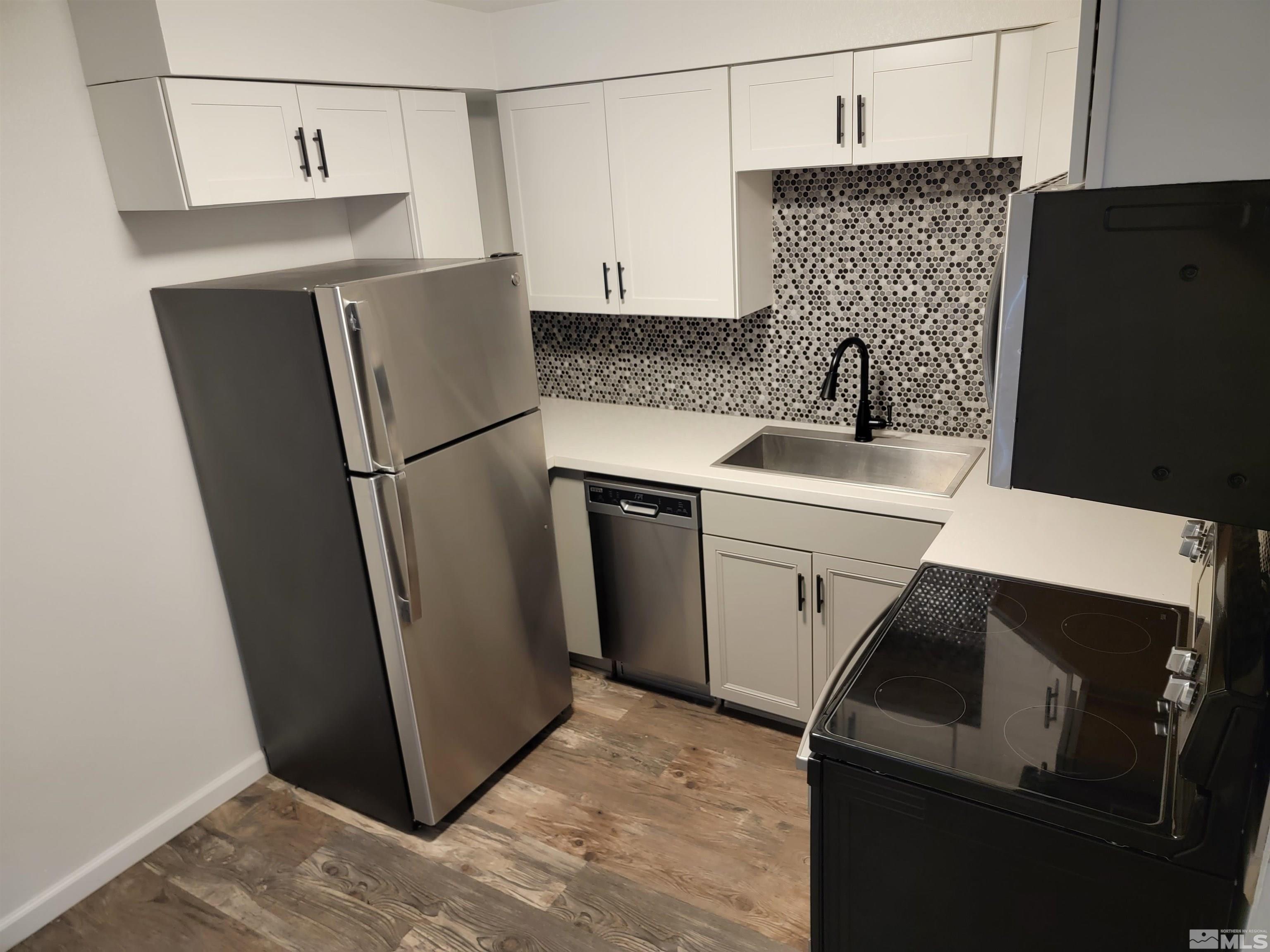 1101 East Taylor Street Reno, NV 89502 - Photo 9 of 17 a utility room with dryer and washer
